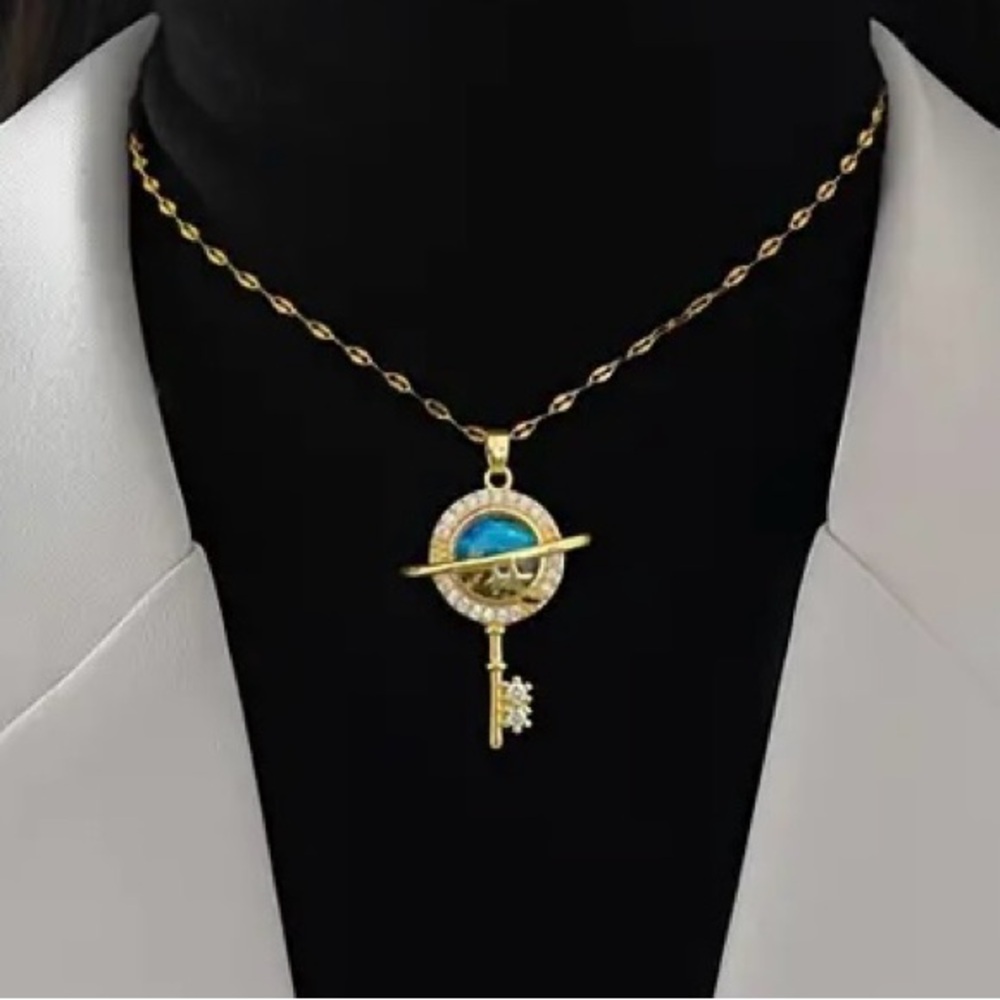 Stainless Steel Planet Key Pendant
Necklace With Zirconia and rhinestones